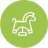 Green circle icon with rocking horse silhouette