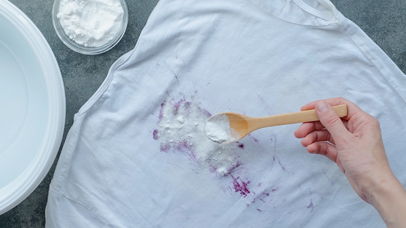 Homemade eco-friendly removing of stains on clothes with baking soda. top view. . High quality photo