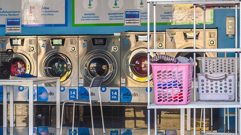 View of laundry service shop with automatic washer dryer available to general customers