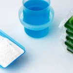 Washing powder dispenser with dry washing powder inside, concentrated washing gel and detergent in water-soluble capsules