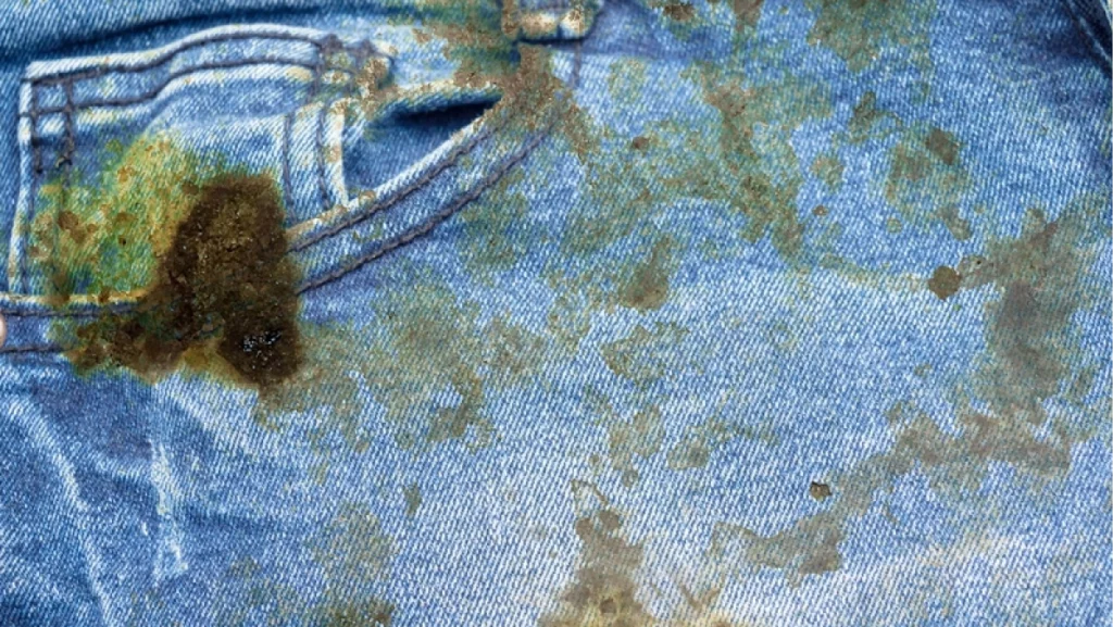 dirty black oil stain on jean texture