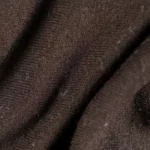 Old shabby synthetic, polyamide and elastane fabric, macro texture.