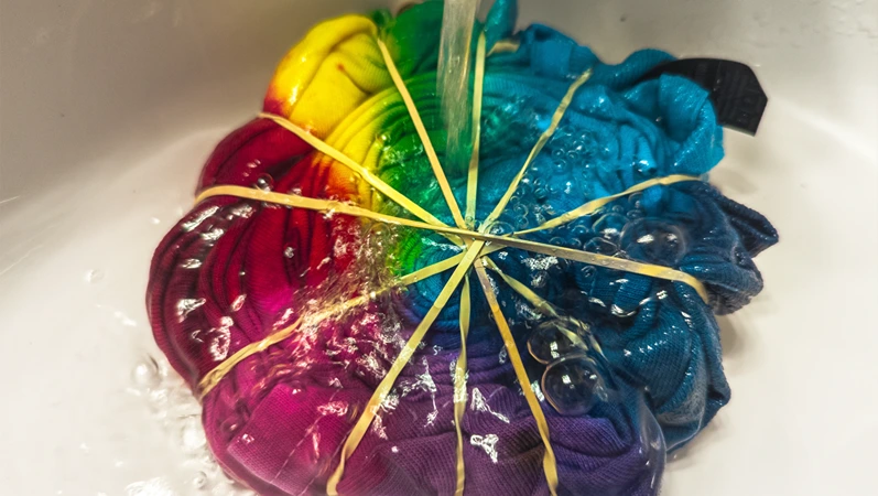 Rinsing Tie Dye Shirt In Sink Rubber Bands Arts And Crafts Trippy Psychedelic